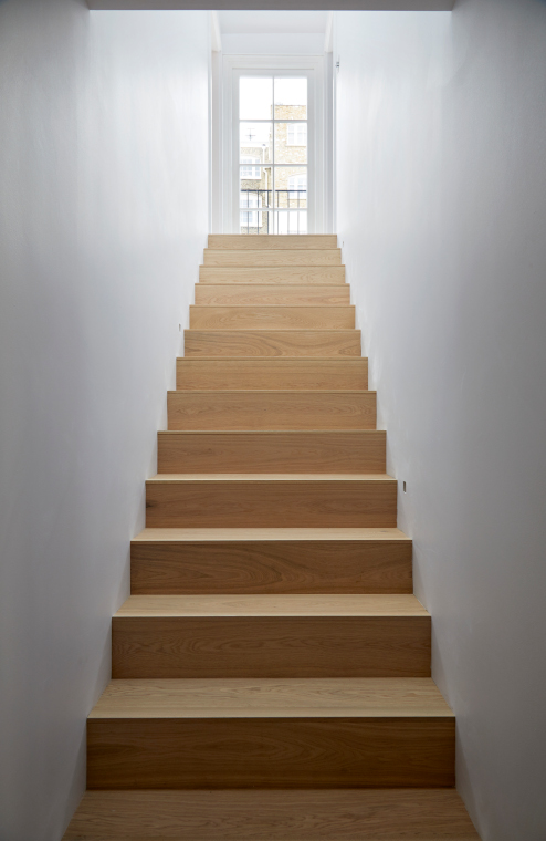 Stairway in Belgravia mews house by Finkernagel Ross