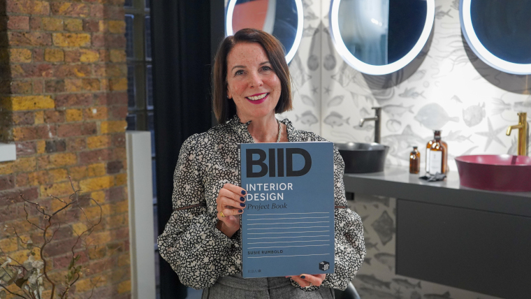 Susie Rumbold of the BIID with the Interior Design Project Book